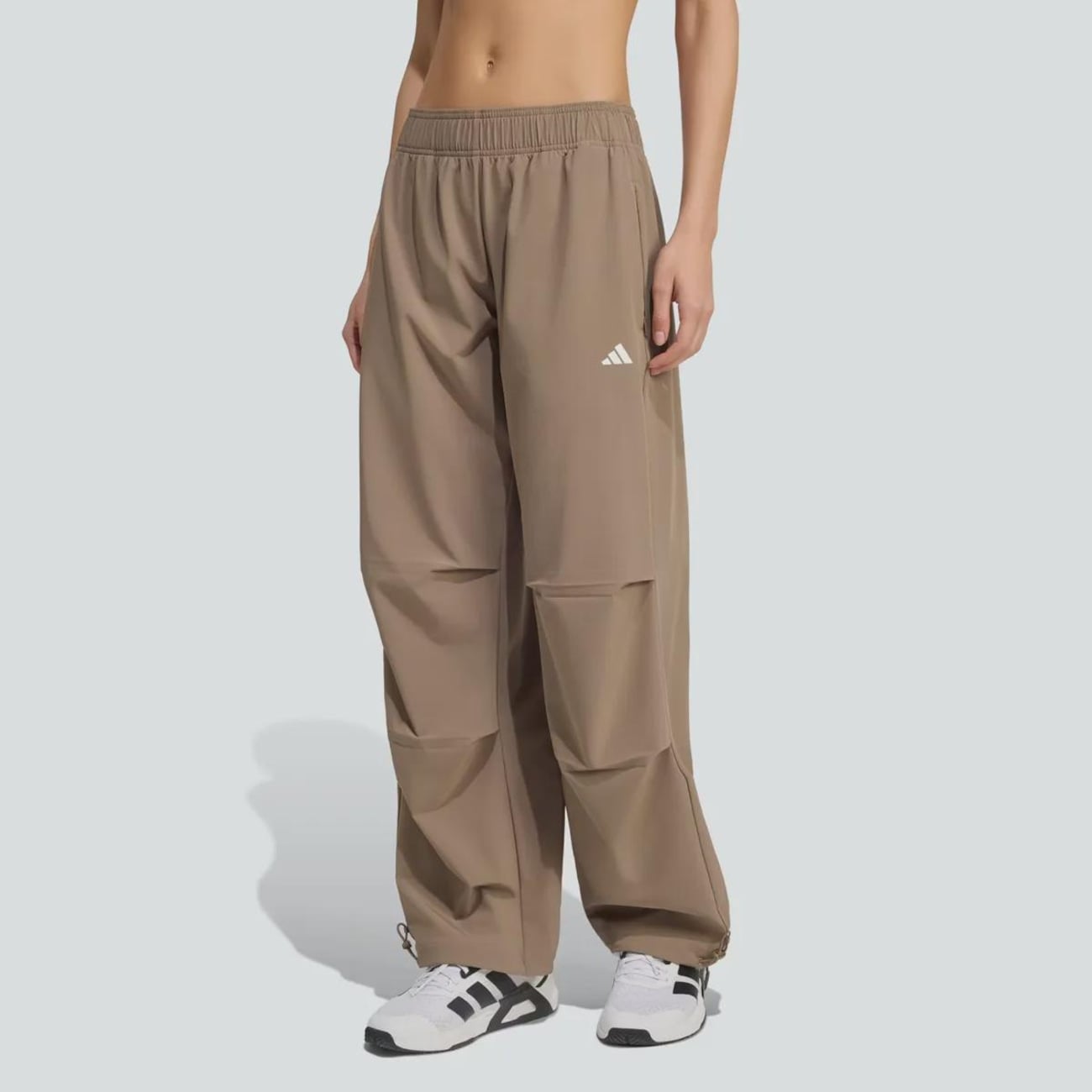 Calça Adidas TR ES Woven Feminina — imagem 1