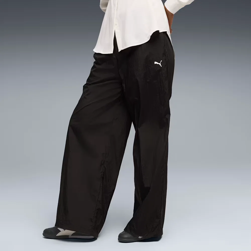 Calça Puma Sport Relaxed Woven Feminina — imagem 1