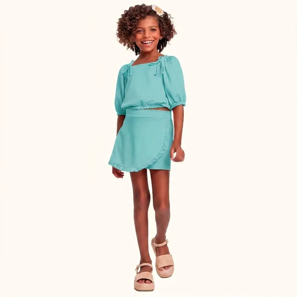 Conjunto blusa / short saia em malha favo com laço decorativo — imagem 1
