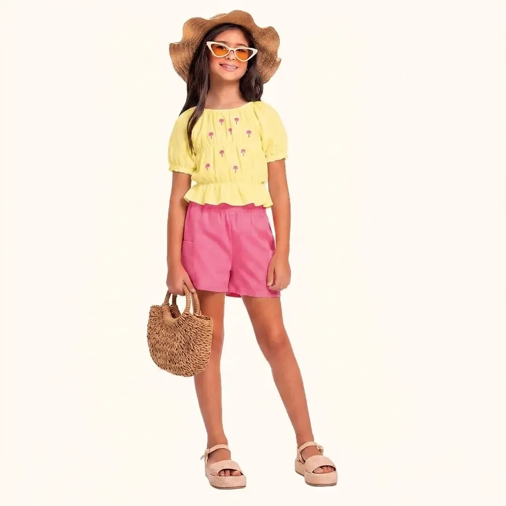 Conjunto blusa em malha florence e short saia em sarja coqueiro com elástico — imagem 1