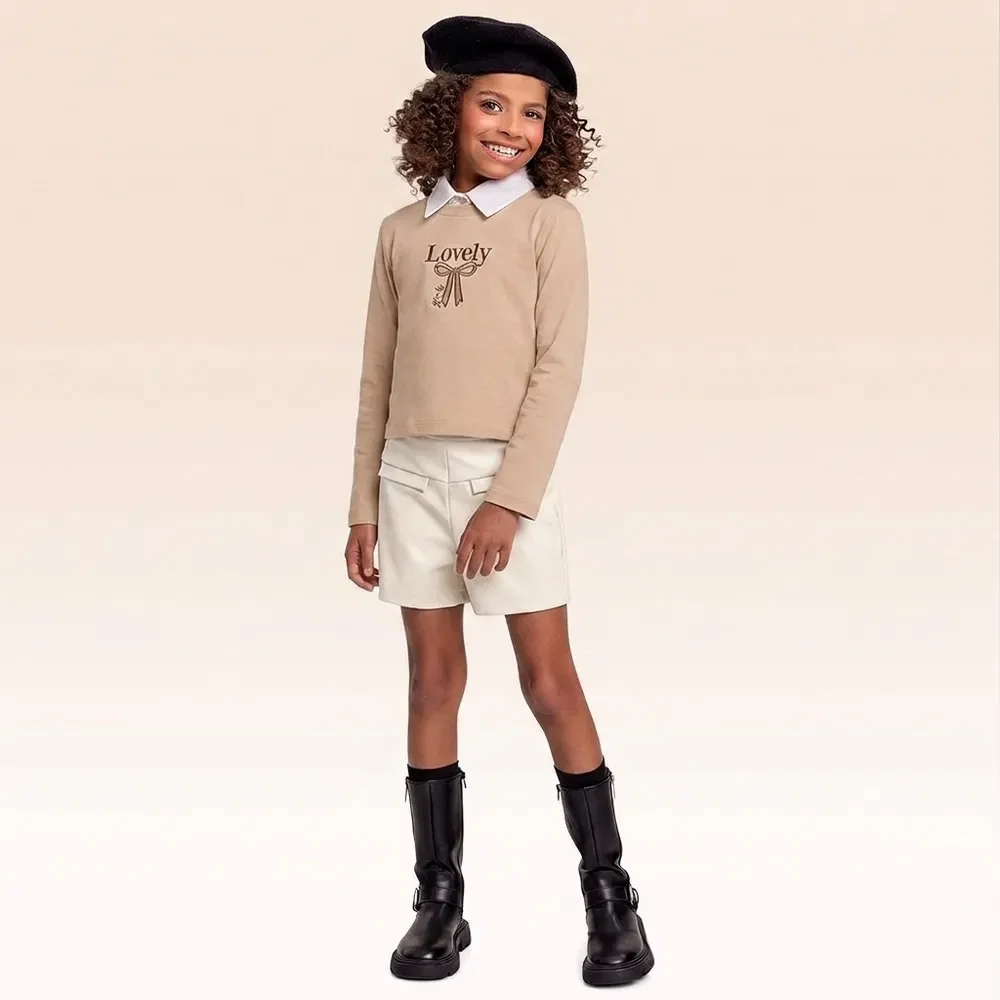 Conjunto blusa manga longa e shorts