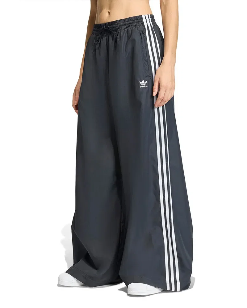 Calça Adidas Larga Firebird Feminina — imagem 1