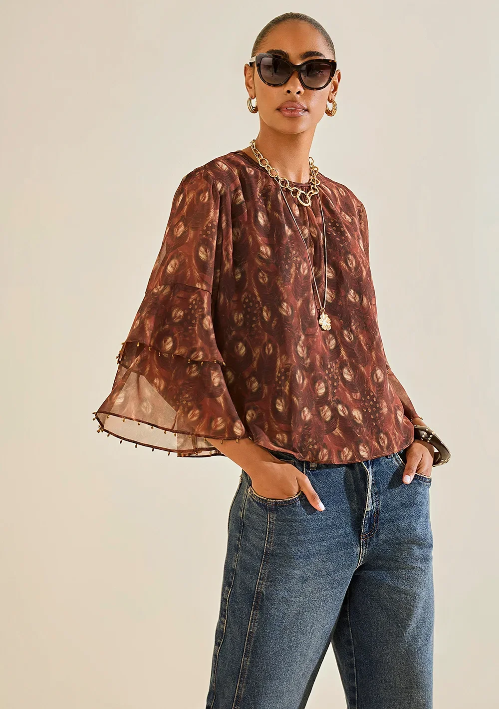 Blusa Morena Rosa Solta Decote Careca Manga Longa Padrão Marrom — imagem 1