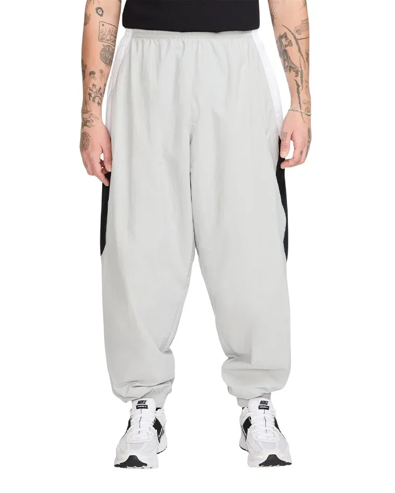 Calça Nike Club Woven Oversized Masculina — imagem 1
