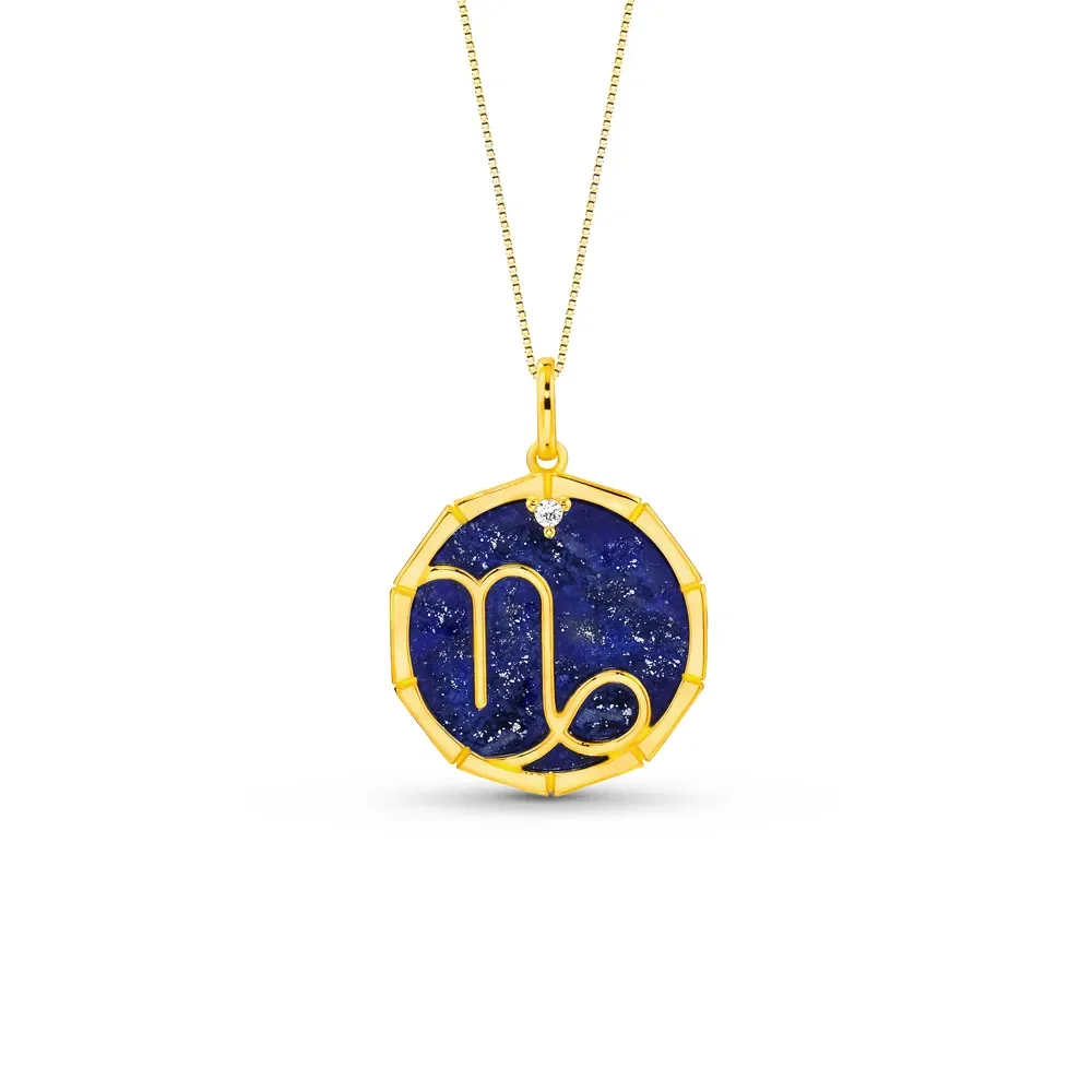 Pingente ZodíAço Capricórnio em Ouro Amarelo 18k com Lápis Lazuli e Safira Incolor, 17mm