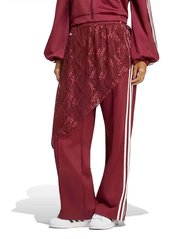 Calça Adidas Firebird 2 em 1 Feminina — imagem 1