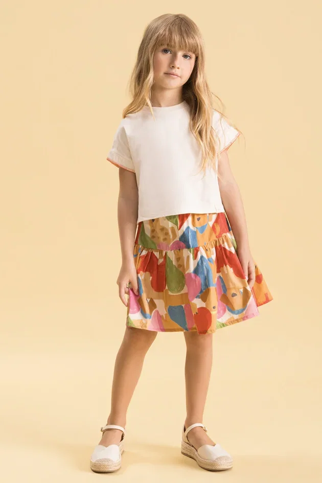 Conjunto Infantil em Algodão com Blusa em Meia Malha e Saia Estampada